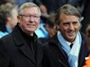ManU's Trainer Sir Alex Ferguson (l.) und sein Gegenspieler von Manchester City, Roberto Mancini.